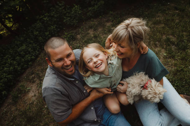 istock Family with Dogs 1960679268