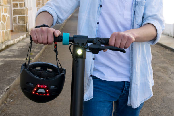 istock Cropped image of a young man with his electric scooter 1960715096