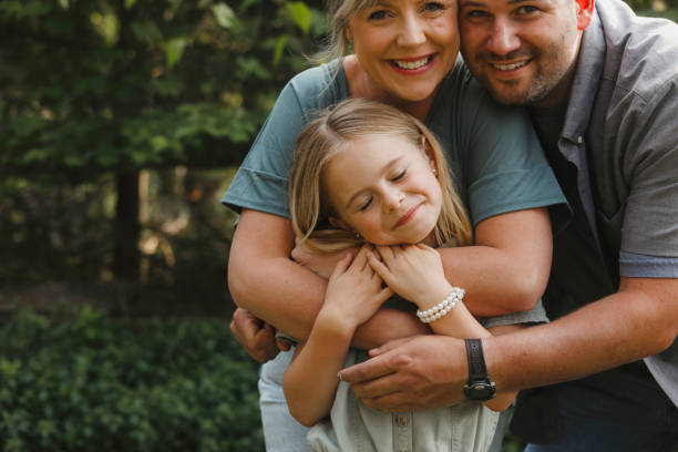 istock Family of Three Outside 1960723458