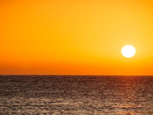 istock Sunrise over sea 1960765759