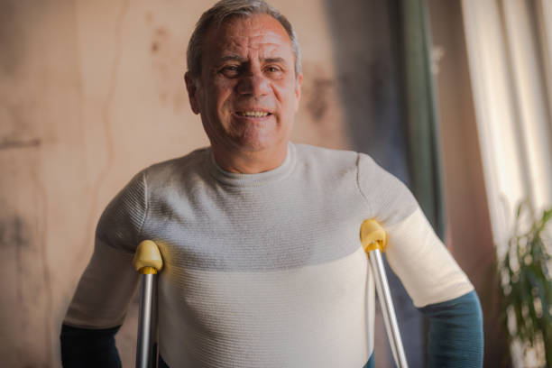 istock Portrait of a disabled person with crutches 1960792521