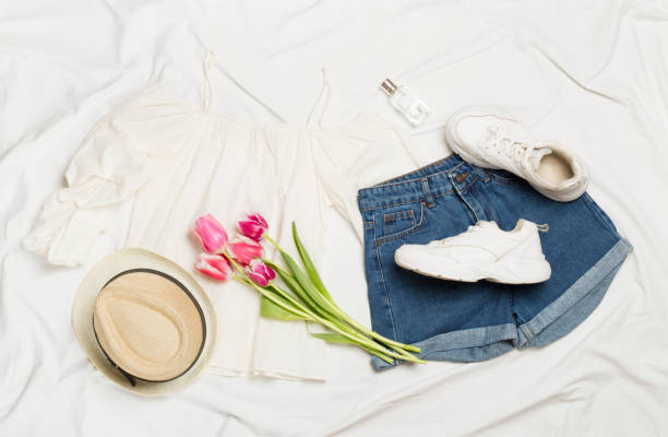 istock Stylish summer outfit on white sheet background, top view 1960858795