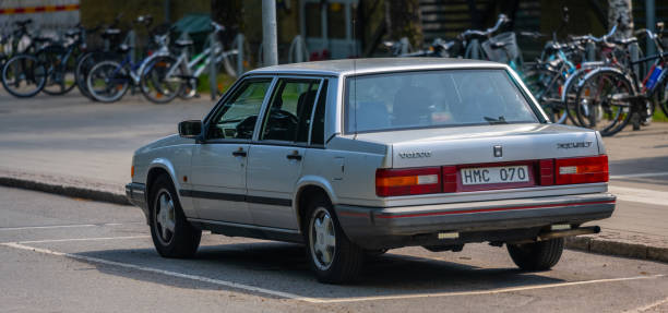 Gothenburg, Sweden - May 20 2023: Classic Silver Volvo 740 GLT car in a parking lot. Gothenburg, Sweden - May 20 2023: Classic Silver Volvo 740 GLT car in a parking lot volvo 740 stock pictures, royalty-free photos & images