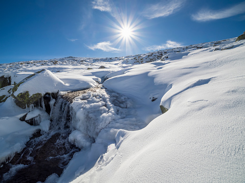Panoramic snowy winter view of Godafoss Waterfall of the gods U-shaped cascade in Laugar Fossholl Northern Iceland Europe