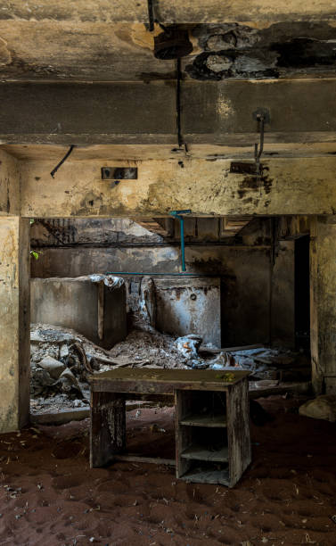 istock Spacious Abandoned Room With Table and Chair 1960951573