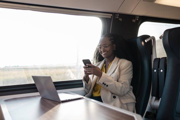 istock African American businesswoman using technology during a train ride 1960964762