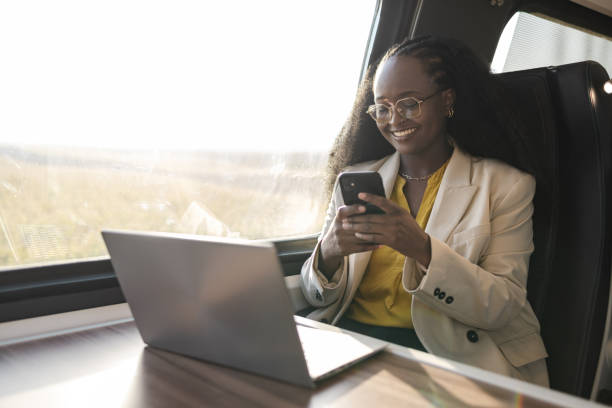 istock African American businesswoman using technology during a train ride 1960964764