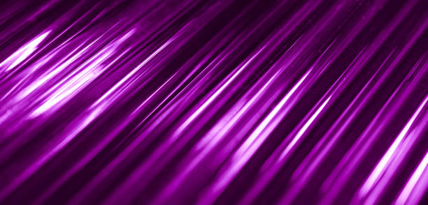 istock glowing optical violet fiber in the dark 1960969051