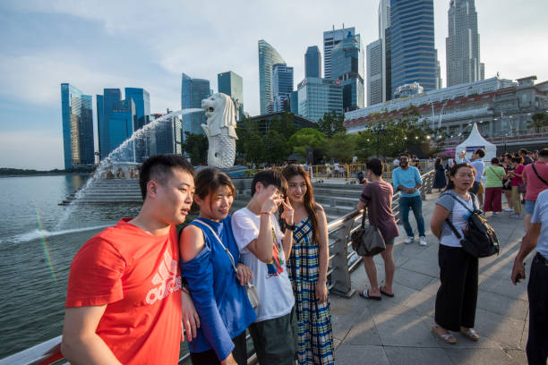 Singapore- 20 Nov, 2020: Merlion fountain in front of the Marina Bay Sands hotel in Singapore. Merlion is a imaginary creature with the head of a lion, seen a symbol of Singapore