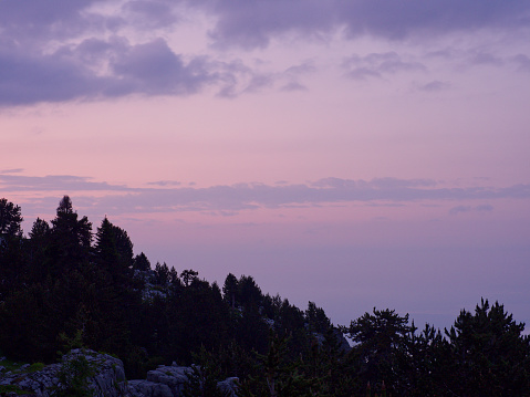 Mountain hillside with horizon at dusk