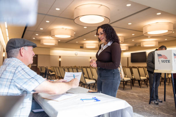 istock Americans checking in to vote at the election 1961052885