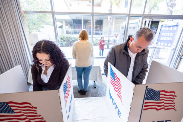 istock Americans voting in an election 1961058615