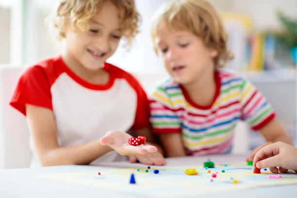 istock Family playing board game. Kids play. 1961058868