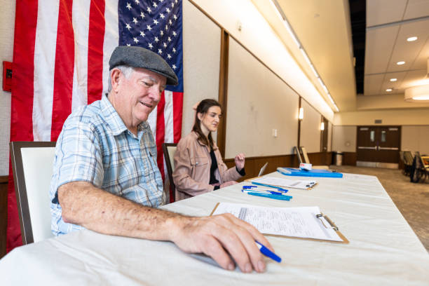 istock Americans checking in to vote at the election 1961059139