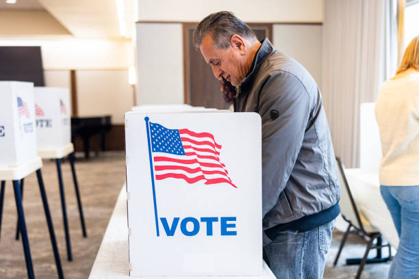 istock Americans voting in an election 1961059153