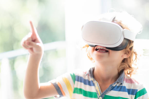 istock Child in virtual reality goggles. VR set for kids. 1961063417