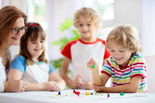 istock Family playing board game. Kids play. 1961068130