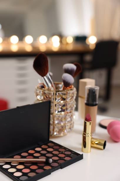istock Different cosmetic products on white table in makeup room 1961076099