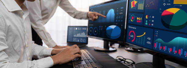 istock Analyst working on BI dashboard on computer monitor. Trailblazing 1961112546