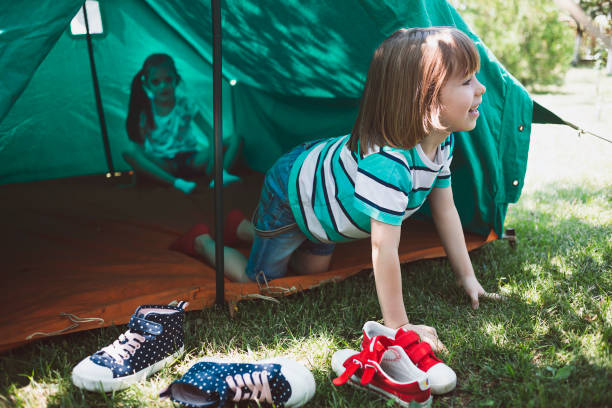 istock Two happy kids in a tent 1961144698