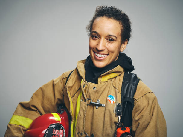 istock Female Firefighter with I VOTED Sticker 1961146777