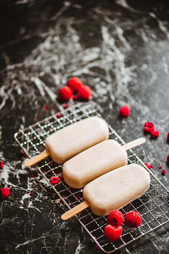 Vegan Vanilla Popsicles with Dried and Fresh Raspberries