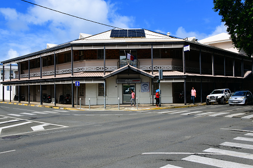 Nouméa, South Province, Grande Terre, New Caledonia: central police station (commissariat central, police nationale), the Hotel de Police - in the French system a 'police hotel' brings together several services: public security of course but also the judicial police, intelligence services, etc. - historic building ample with verandas, corner of Sebastopol Street and Victoire - Henri Lafleur Avenue.