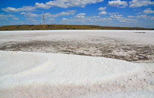 Salt desert - drying Kuyalnitsky estuary. White table salt at the bottom of a dried-up reservoir, Ukraine
