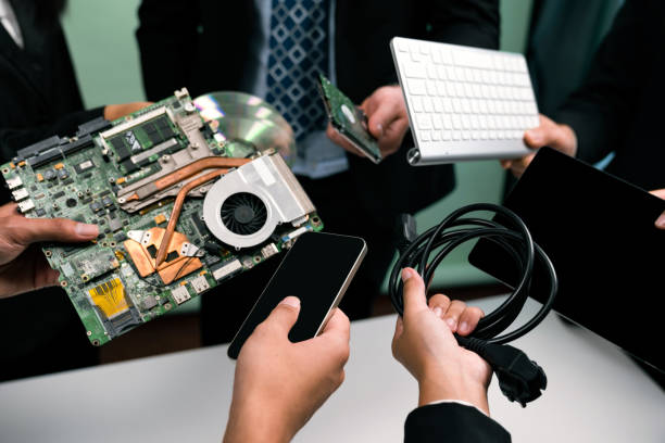 istock Business people holding electronic waste on isolated background. Quaint 1961210052