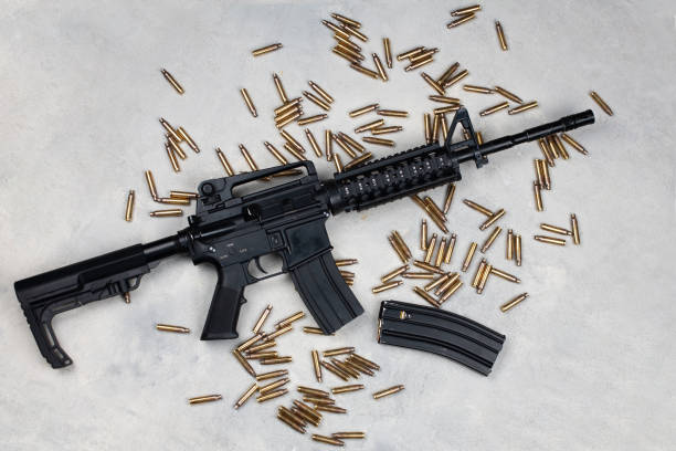 istock M4 carbine and 5.56mm shells and magazine with bullets 1961221210