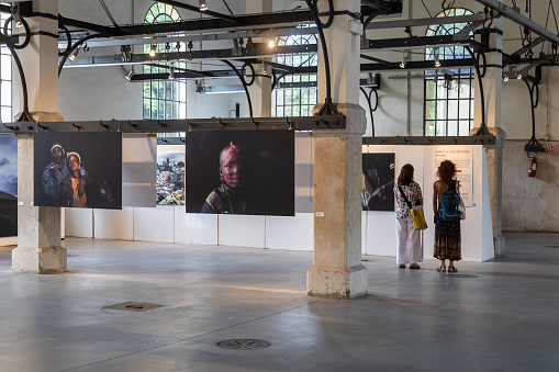 Padua, Veneto, Italy - Jun 22nd, 2023: Visitors at International Month of Photojournalism (IMP Festival), at Cattedrale ex Macello Cultural Center