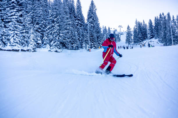 istock Young man skiing in the mountains 1961278941