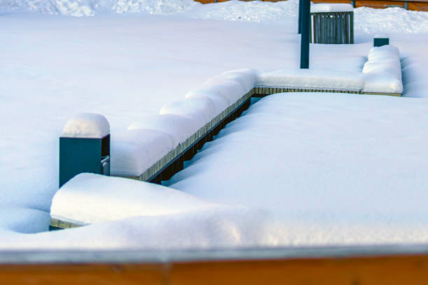 istock Benches in the park under a thick layer of snow 1961336813