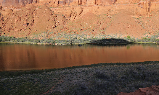 A fishing boat on the Colorado river on the north half of Horseshoe Bend.  Located just outside of Page, Arizona.