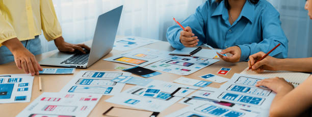 istock Panorama banner of startup company employee planning on user interface. Synergic 1961388603
