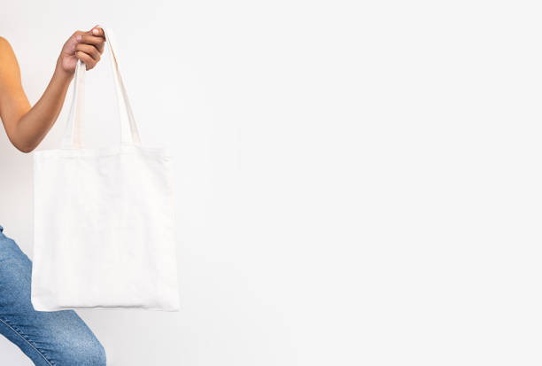 istock Choose shopping with reusable textile bag. Tote bag mock up. 1961424317