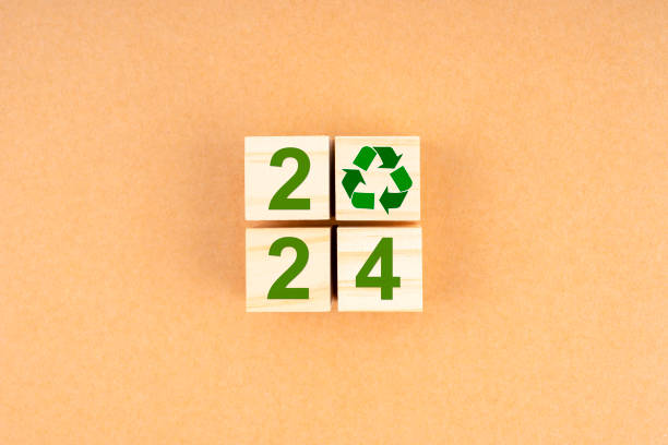 istock 2024 Numbers and recycle symbol on wooden cube. 1961430078