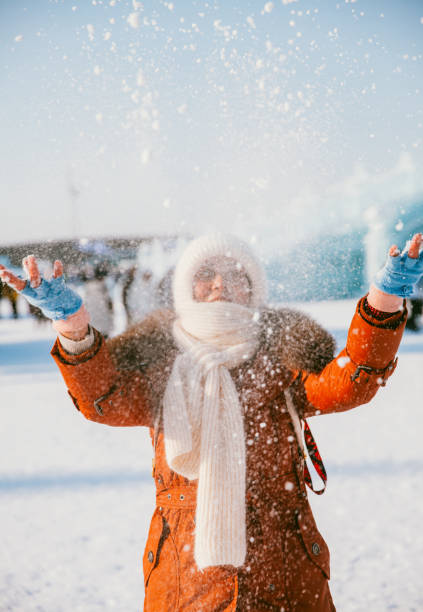 Asian Senior Travelling in Haerbin durig Winter Time