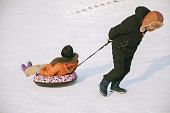 Asian Senior Travelling in Haerbin durig Winter Time