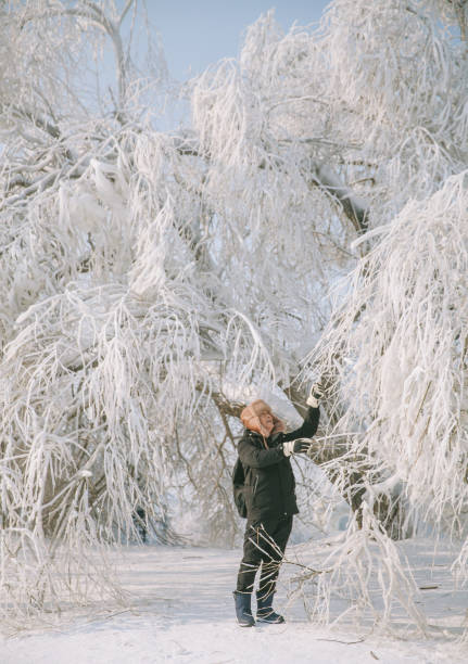 Asian Senior Travelling in Haerbin durig Winter Time
