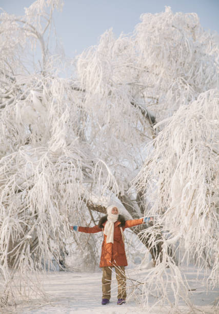 Asian Senior Travelling in Haerbin durig Winter Time