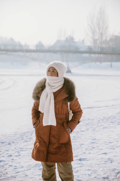istock Asian Senior Travelling in Haerbin durig Winter Time 1961509196