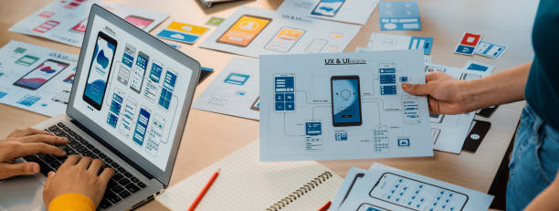 istock Panorama banner of startup company employee planning on user interface. Synergic 1961583021