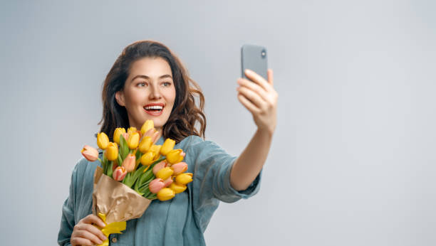 istock woman with flowers 1961587704