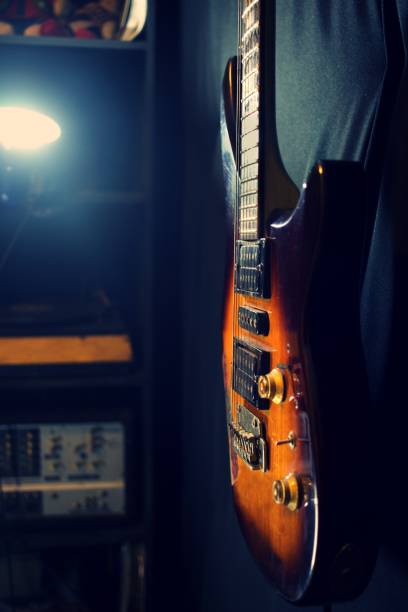 istock antique electric guitar hanging on the wall 1961626482