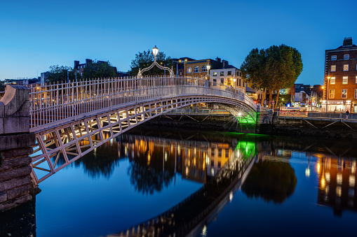 The famous Ha'penny Bridge in Dublin, Ireland, at twilight