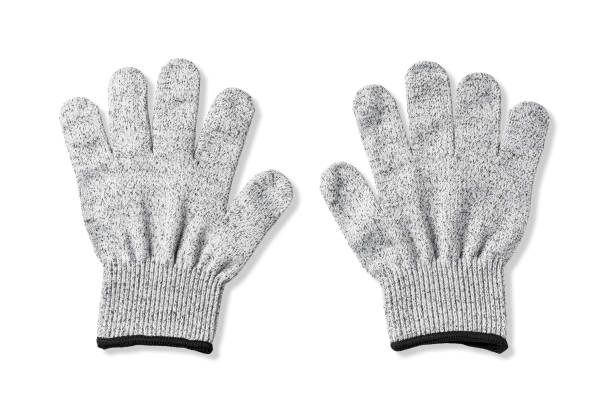 istock Blade-proof gloves placed against a white background. 1961730476