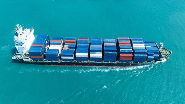 istock Cargo Container Ship top view. container ship running in the ocean import export shipping industry freight and transportation logistics concept. commercial shipping by sea 1961755855