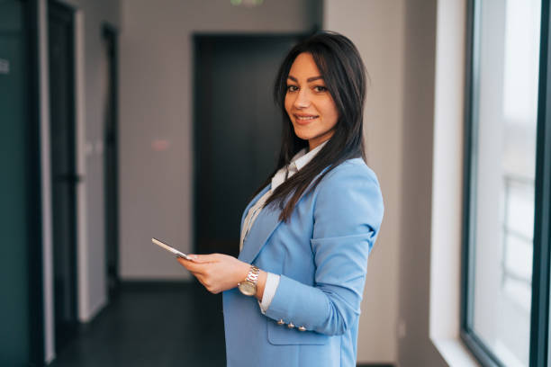 istock Young businesswoman with digital tablet at work 1961779532
