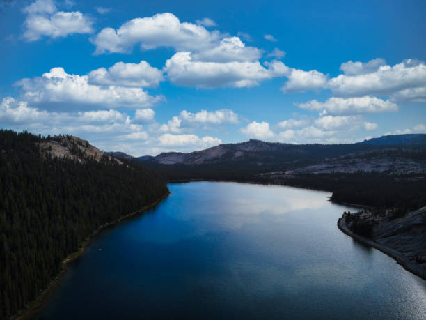 istock a lake in a forested area with mountains on both sides 1961780711